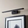 Zoie Modern LED Adjustable Picture Wall Light 2 Zoie Modern LED Adjustable Picture Wall Light -Dunelm 30921721 alt01